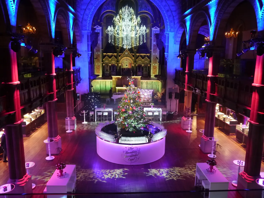 Architectural Uplighting, Breakup wash, round bar, poseur tables and christmas tree in cathedral